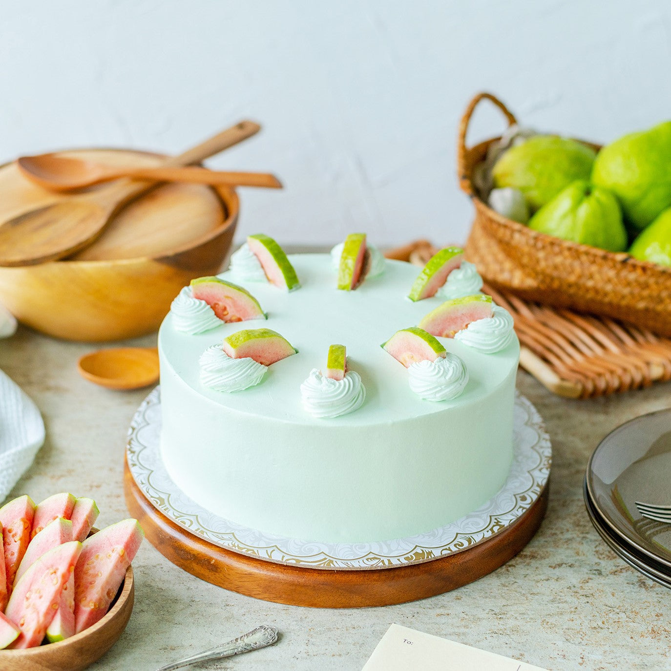 Chiffon cake, guava jam, buttercream frosting, fresh guava slices